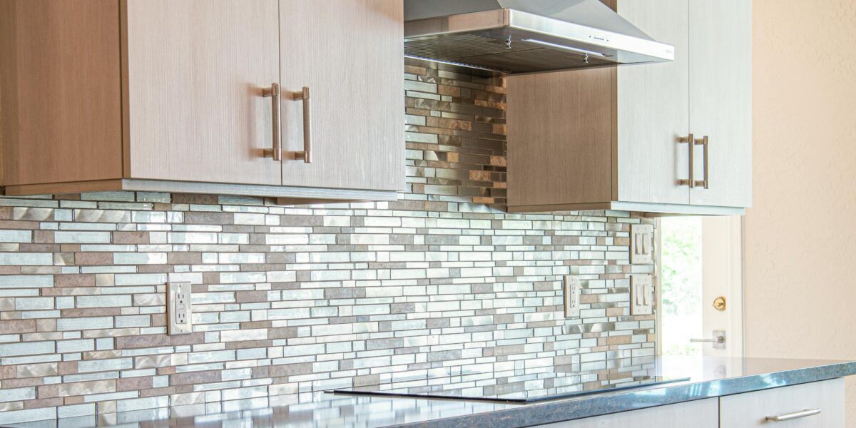 Stylish modern kitchen with elegant cabinets and sleek backsplash design
