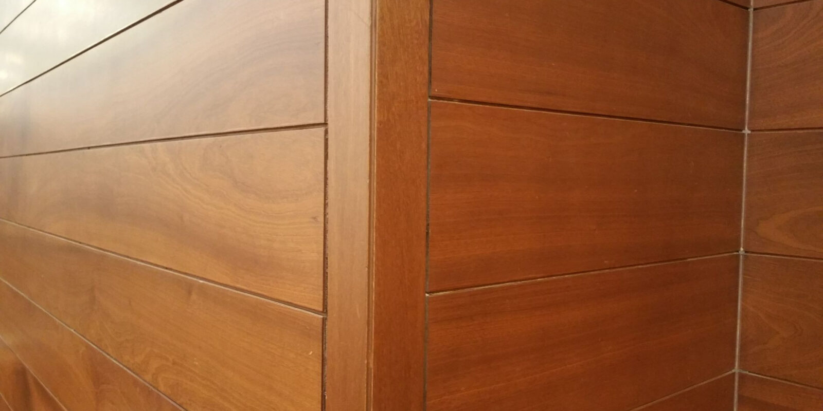 Close-up of modern wooden wall panels showcasing clean lines and texture.