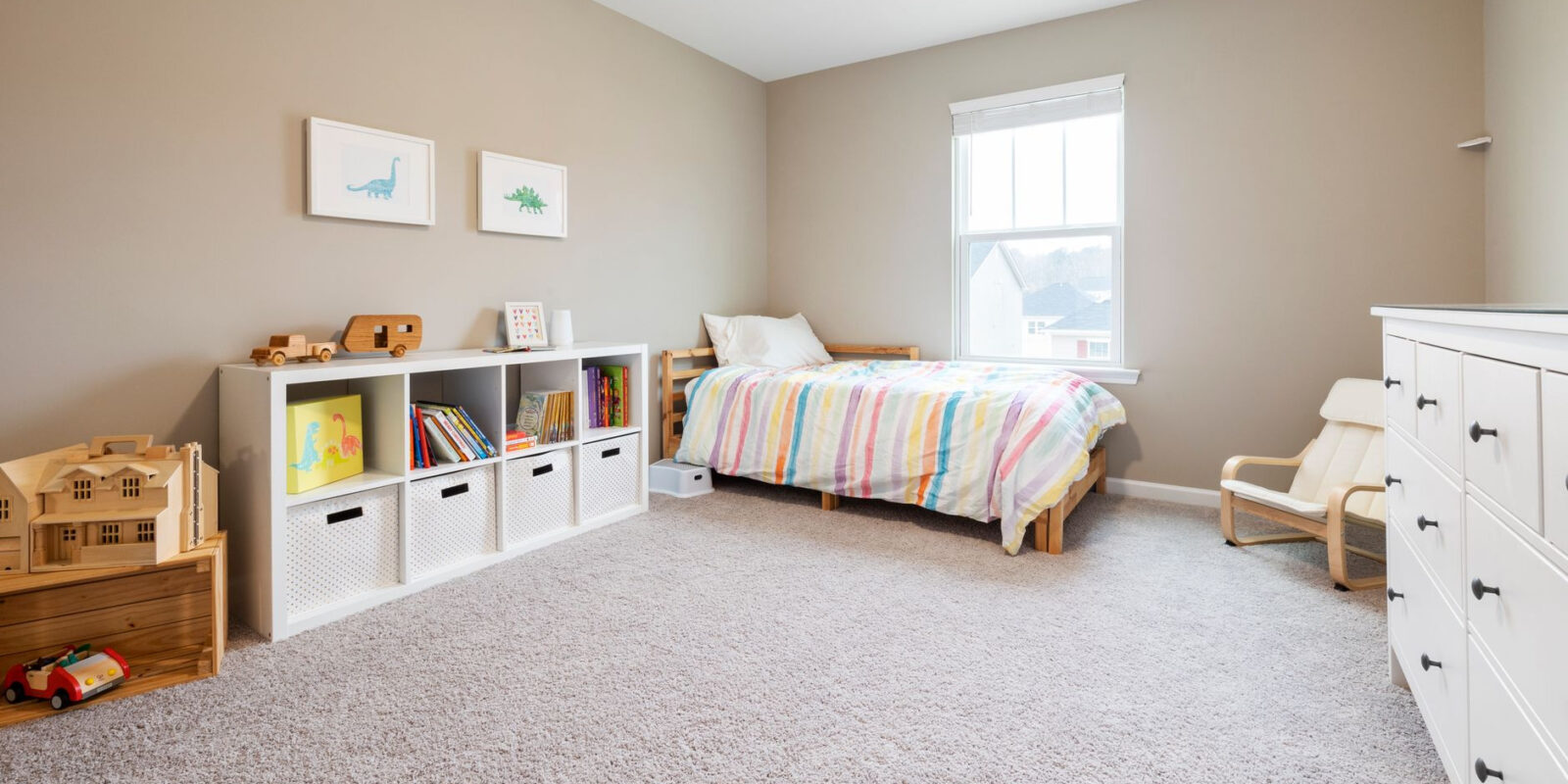 Inviting children's bedroom with colorful decor and modern furniture.